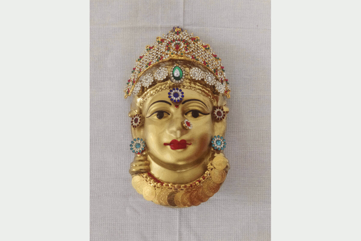 	 Another  view ofGowri Decorated Face Gold